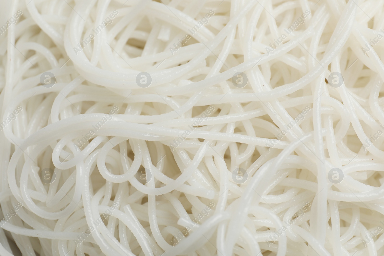Photo of Closeup view of cooked rice noodles as background