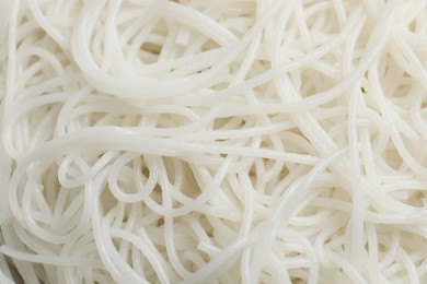 Closeup view of cooked rice noodles as background