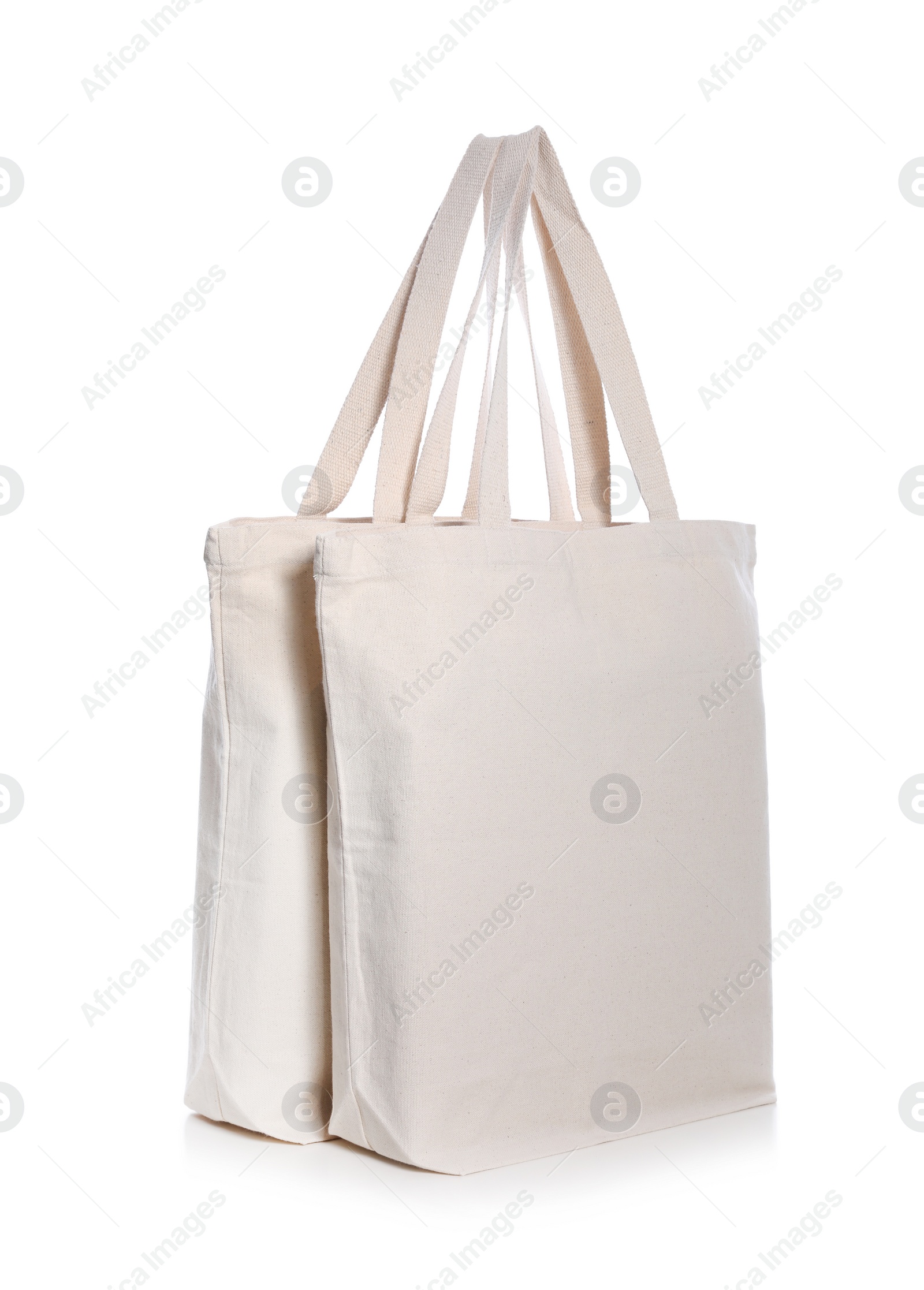 Photo of Eco bags on white background. Mock up for design