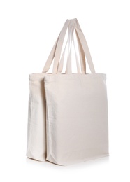 Photo of Eco bags on white background. Mock up for design