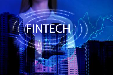 Image of Fintech concept. Double exposure of cityscape and businesswoman, closeup