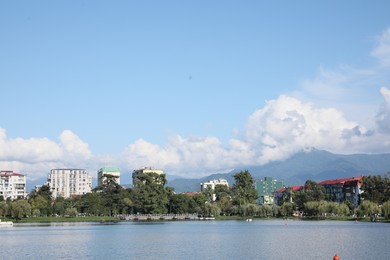 Batumi, Georgia - October 12, 2022: Picturesque view of city near Nurigeli lake and mountains