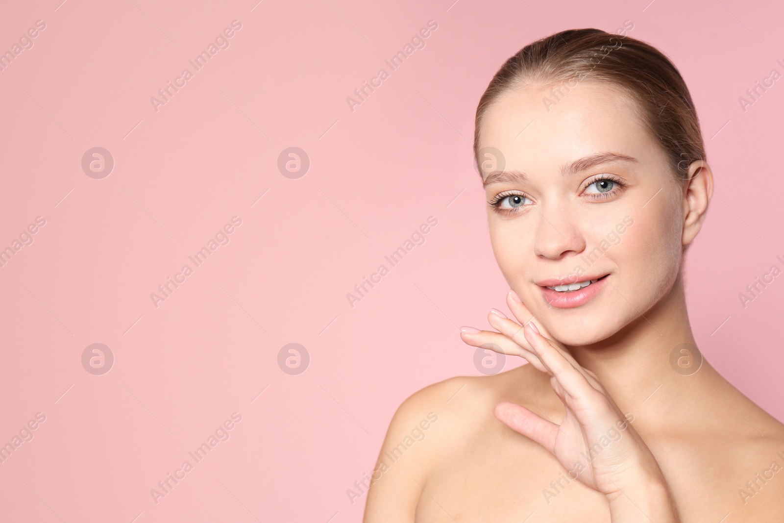 Photo of Portrait of beautiful young woman and space for text on color background. Cosmetic surgery concept