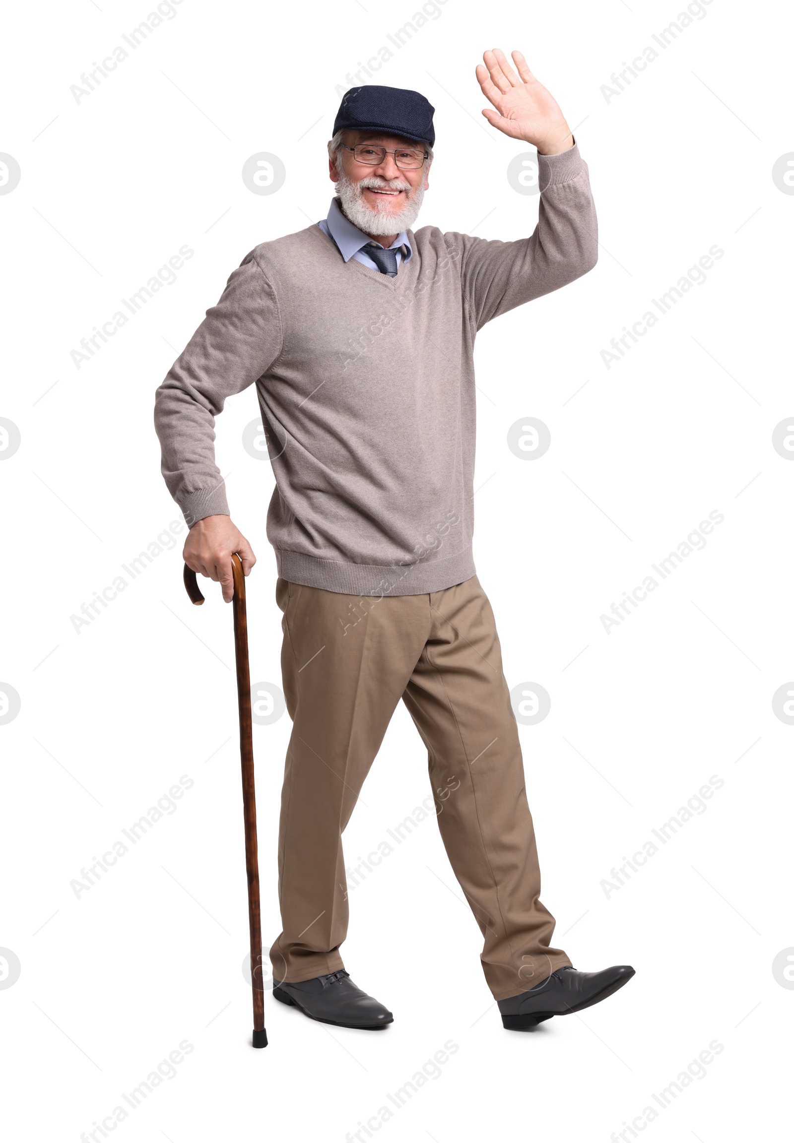 Photo of Senior man with walking cane waving on white background