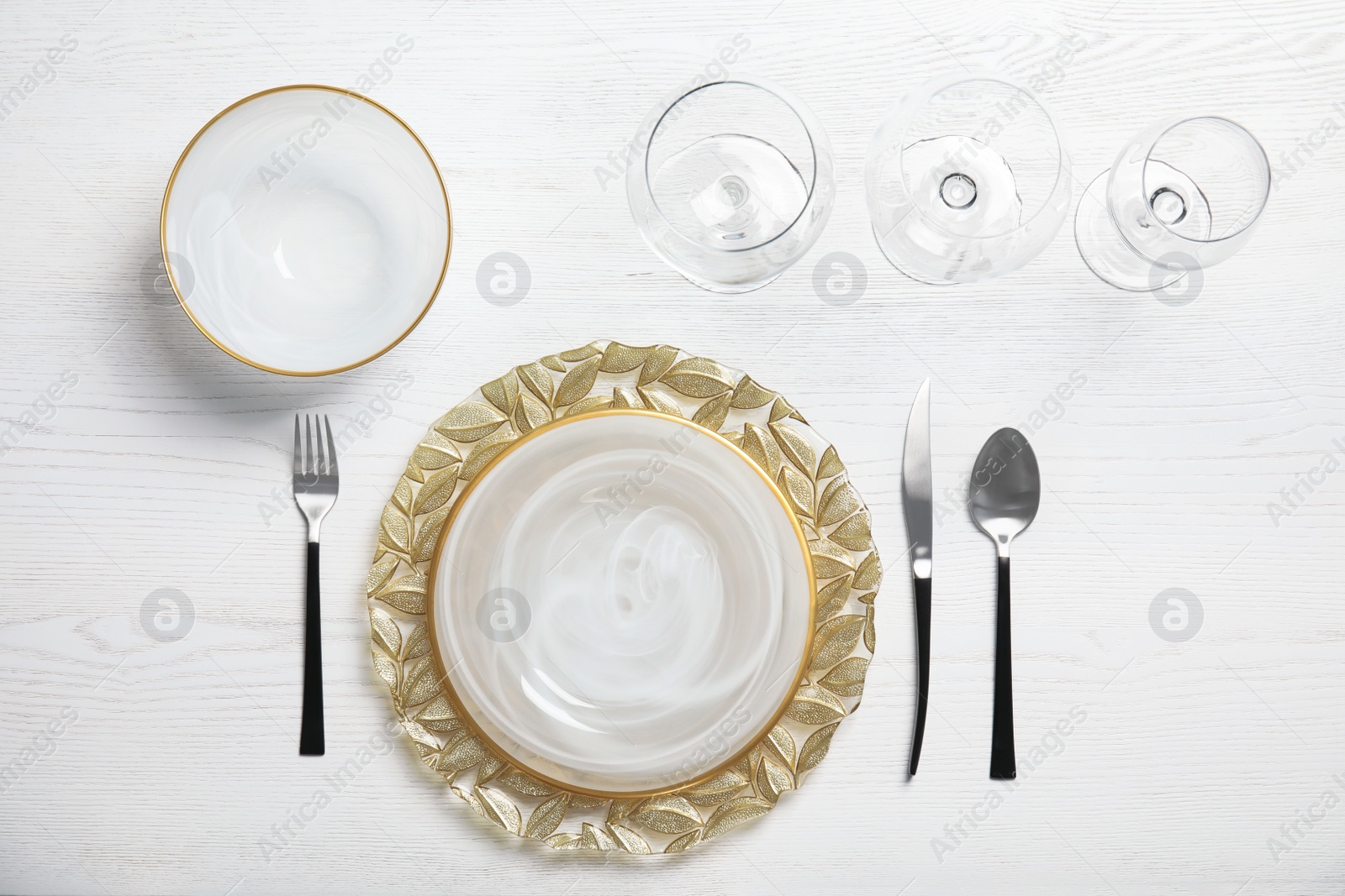 Photo of Elegant table setting on light background, top view