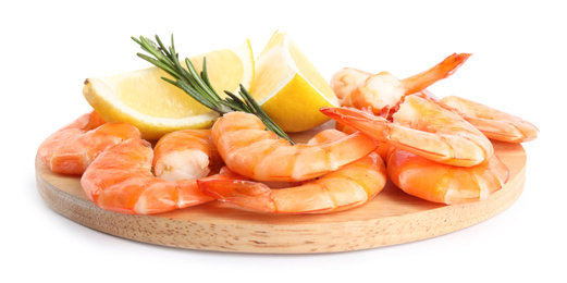 Photo of Delicious cooked shrimps served with lemon and rosemary on white background