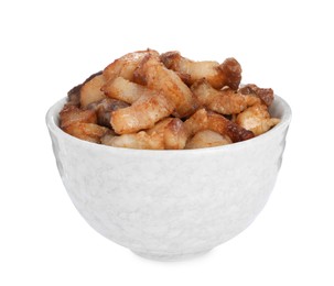 Tasty fried cracklings in bowl on white background. Cooked pork lard