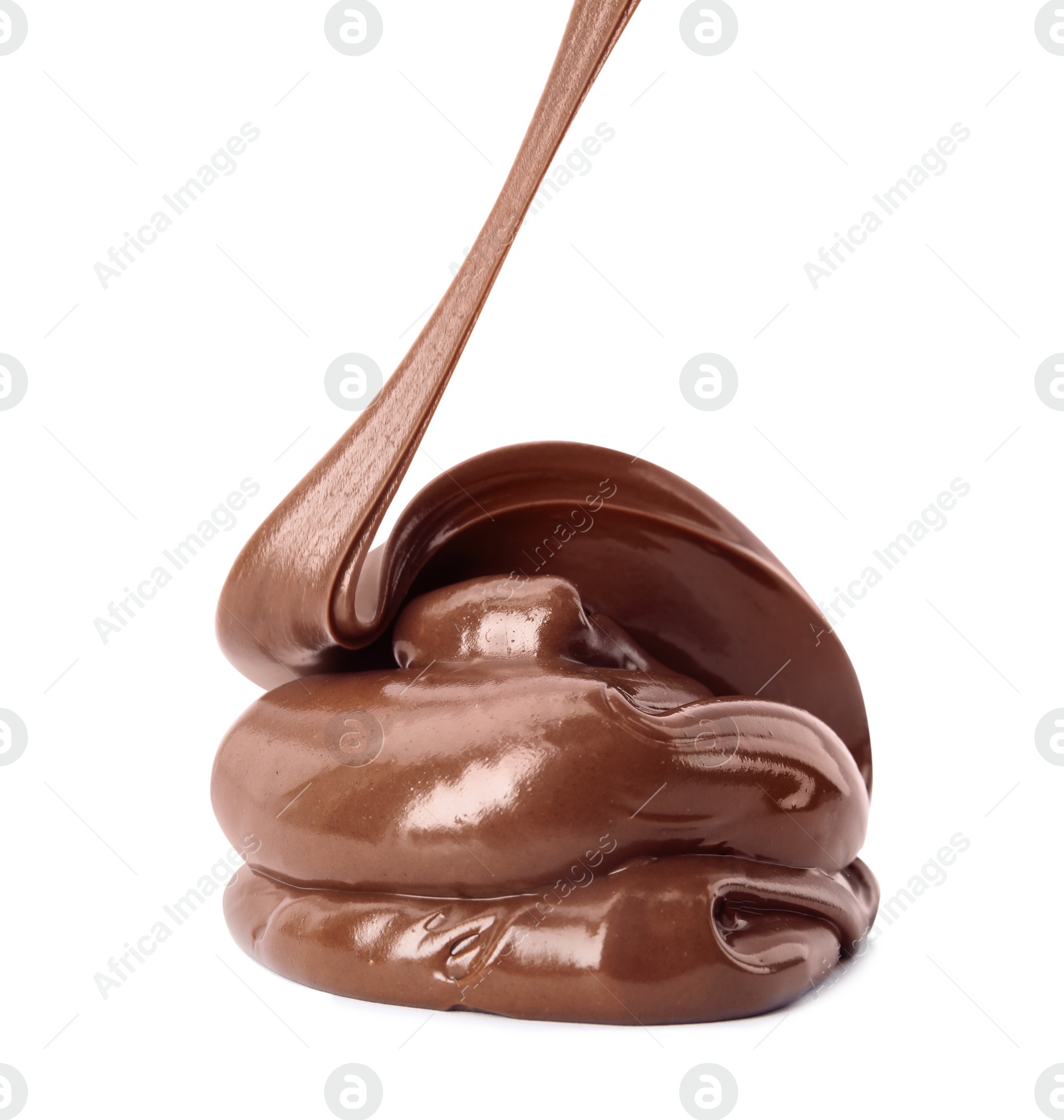 Photo of Pouring sweet chocolate cream on white background