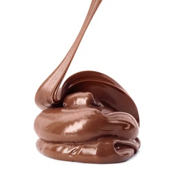 Photo of Pouring sweet chocolate cream on white background