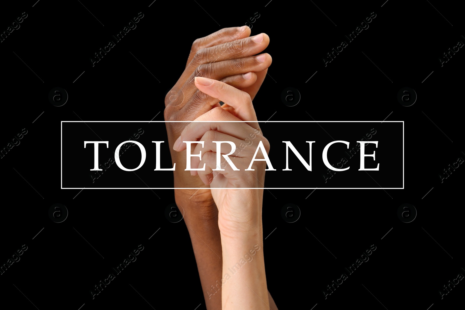 Image of Tolerance, support and cooperation concept. Woman and man of different races holding hands on black background, closeup