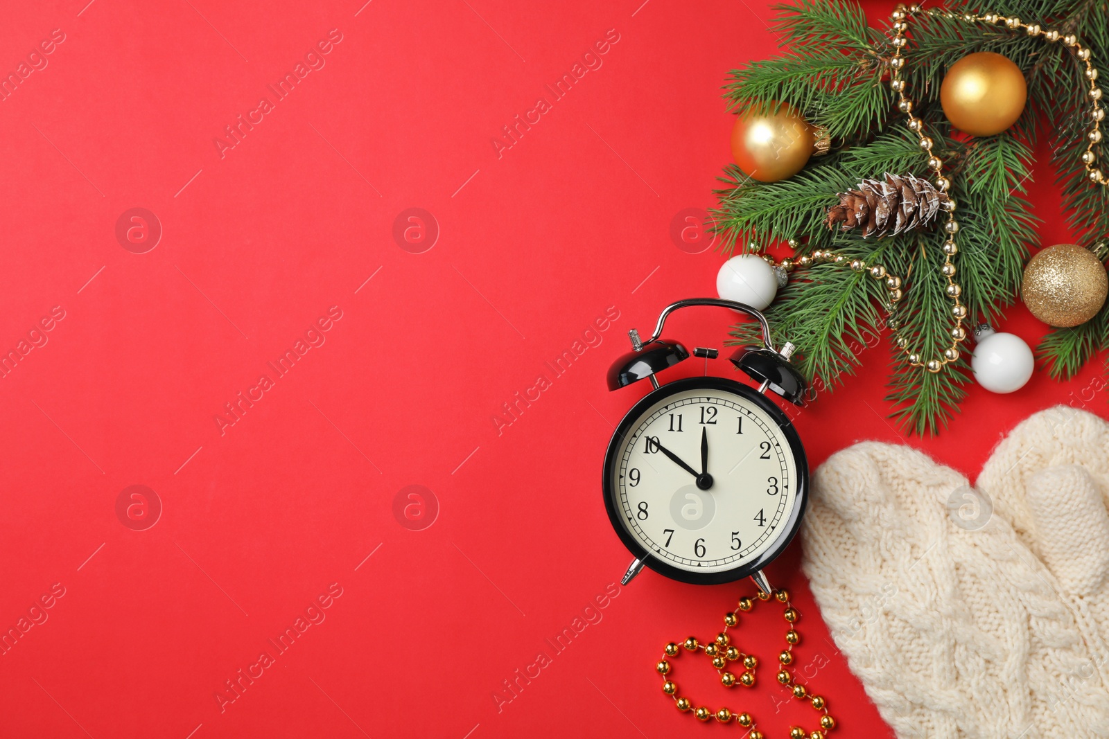 Photo of Retro alarm clock and decor on color background, top view. Christmas countdown