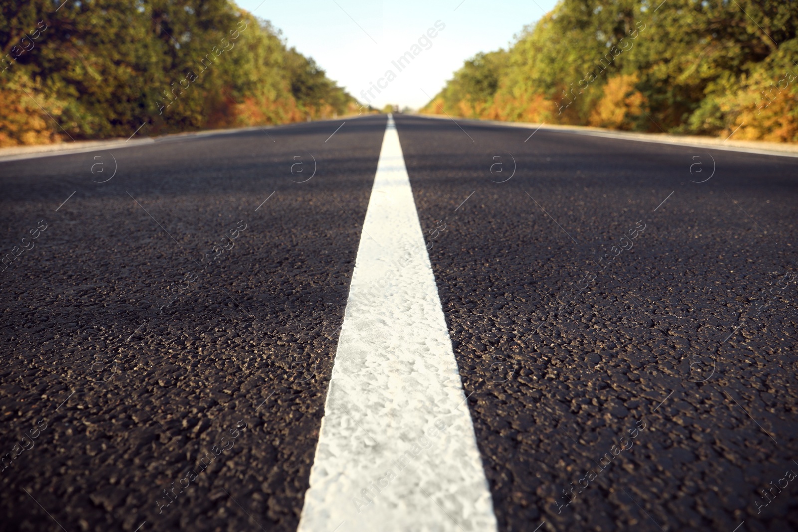 Photo of Beautiful view of empty asphalt highway, closeup. Road trip