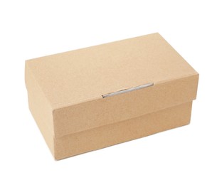 Photo of One closed cardboard box isolated on white