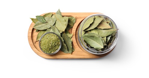 Photo of Whole and ground aromatic bay leaves on white background, top view