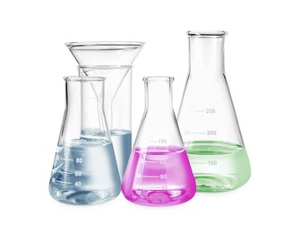 Different laboratory glassware with colorful liquids isolated on white