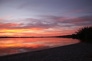 Picturesque view of beautiful sunset over river. Nature healing power