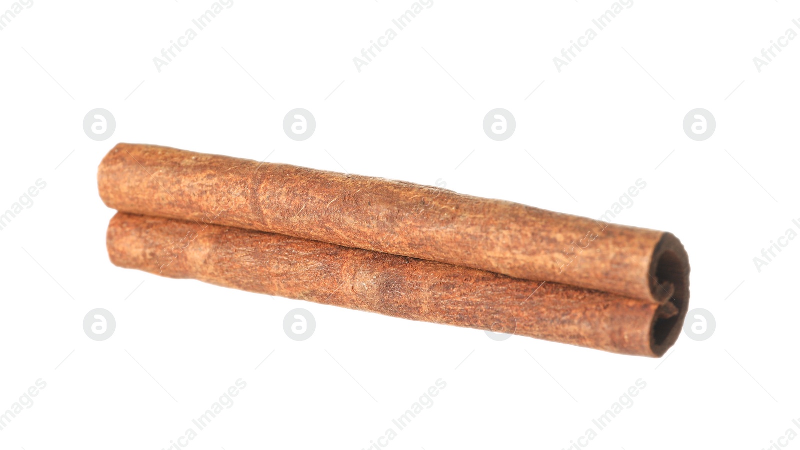 Photo of One aromatic cinnamon stick isolated on white