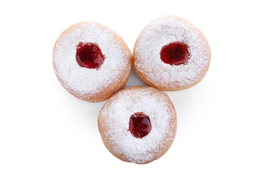 Hanukkah doughnuts with jelly and sugar powder on white background, top view