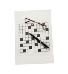 Photo of Blank crossword, eyeglasses and pen on white background, top view