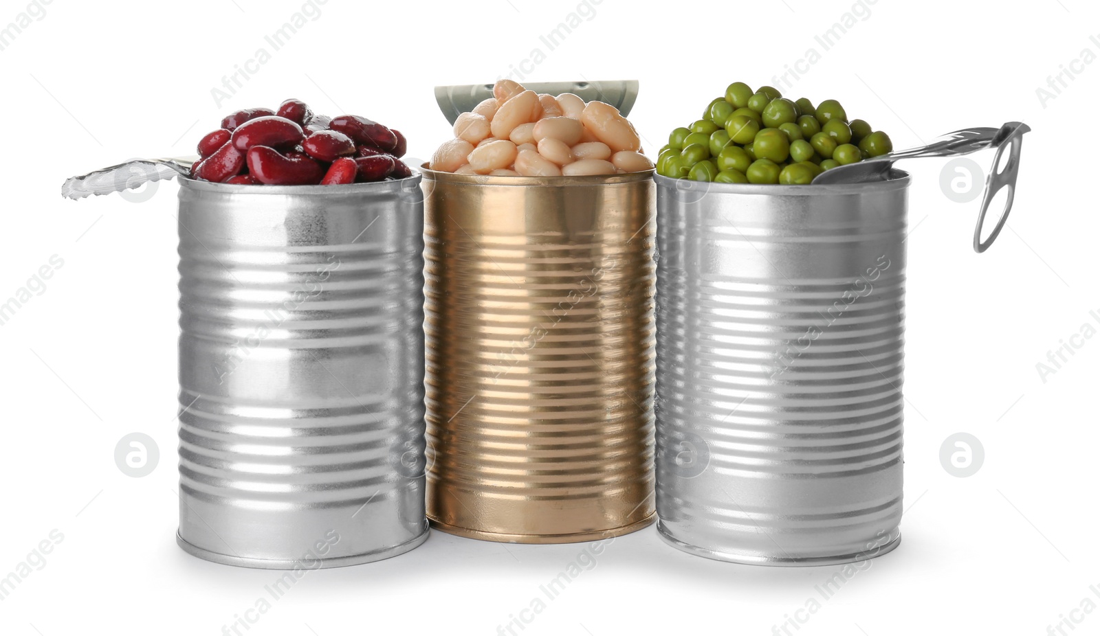 Photo of Tin cans with conserved vegetables on white background