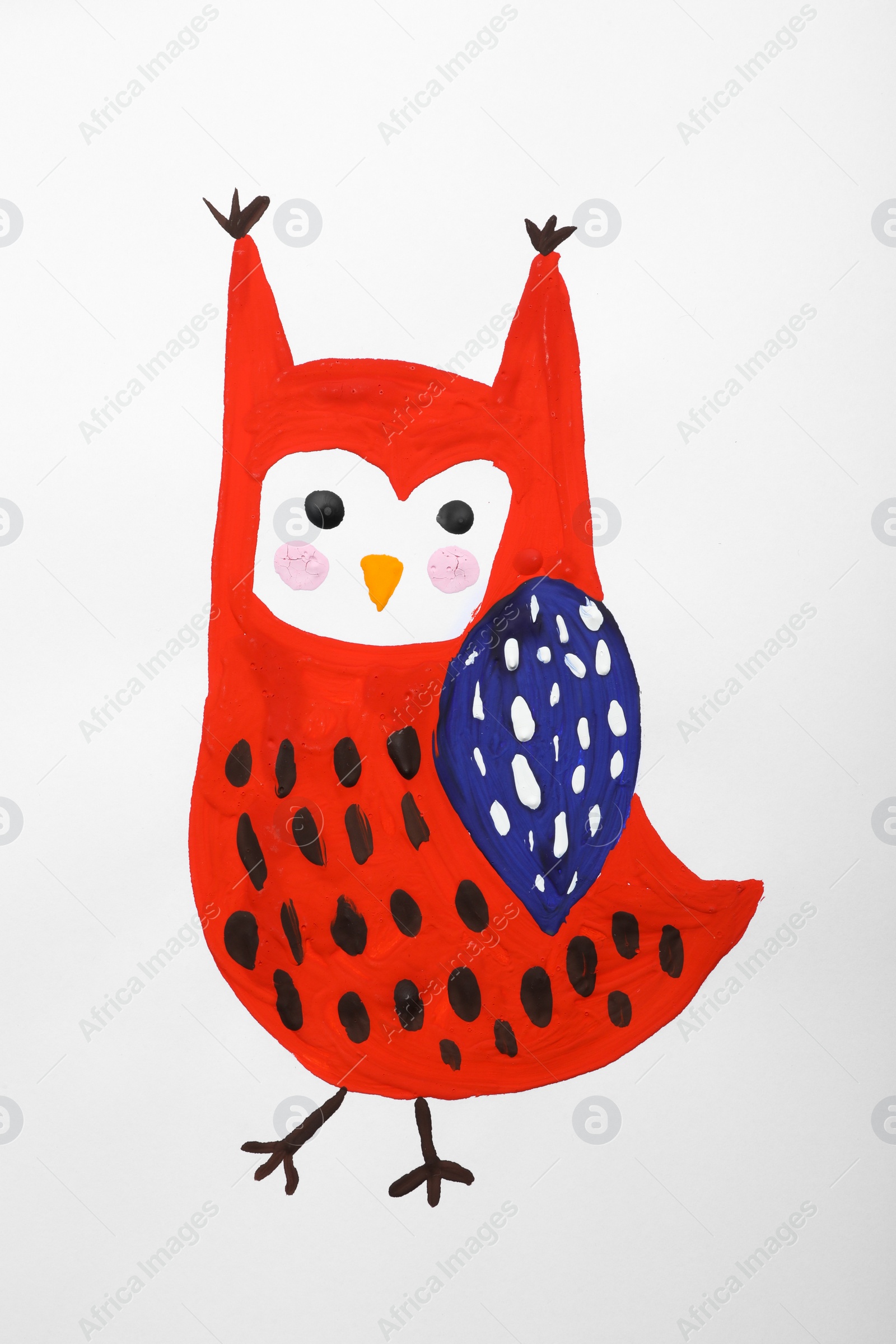 Photo of Child's painting of owl on white paper