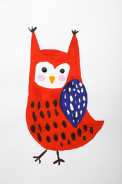 Photo of Child's painting of owl on white paper