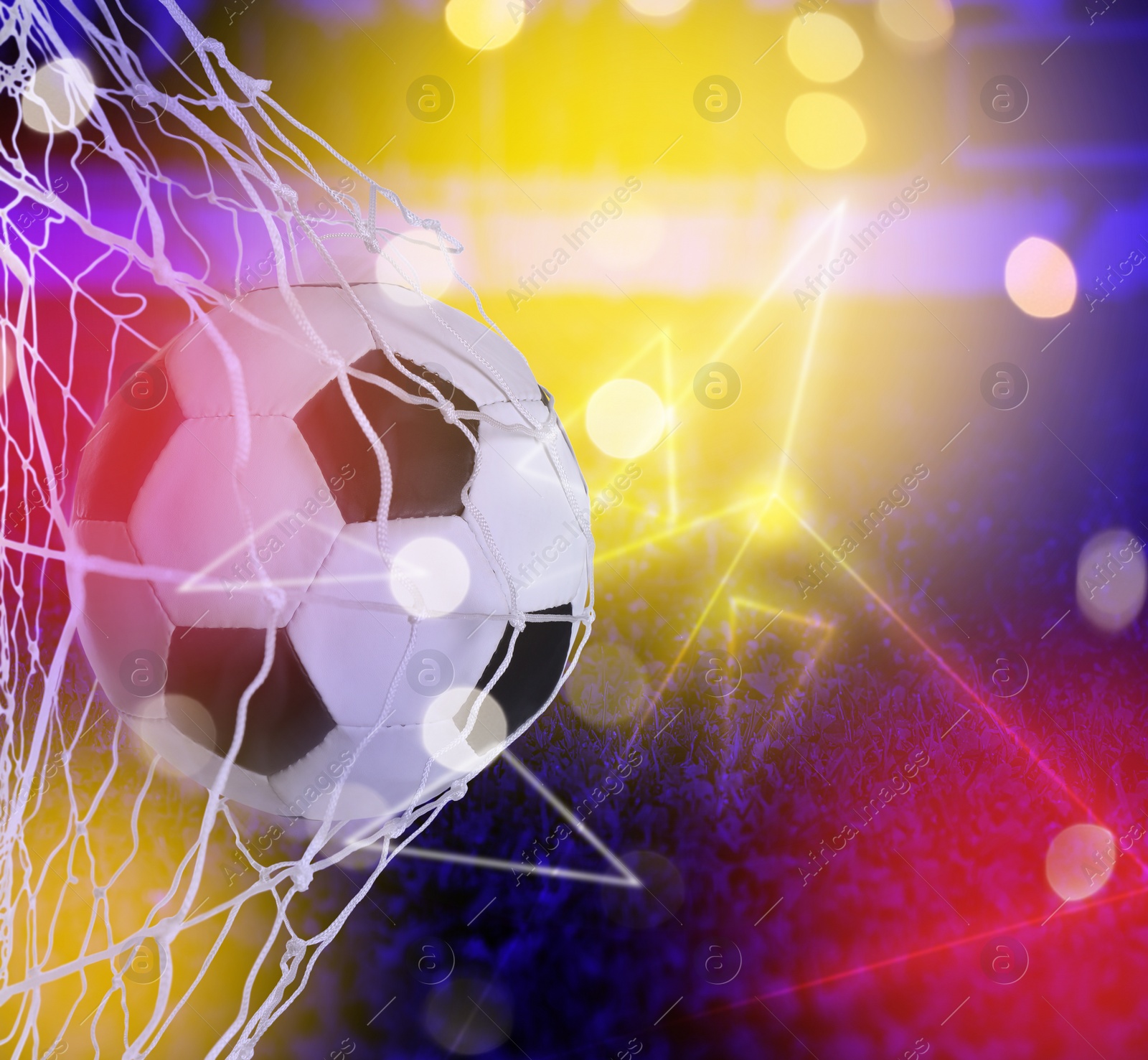 Image of Soccer ball in net against color background. Bokeh effect