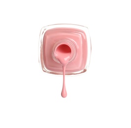 Pouring color nail polish from bottle on white background