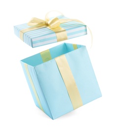 Photo of Beautifully decorated gift box on white background