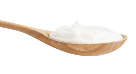 Photo of One wooden spoon with mayonnaise isolated on white