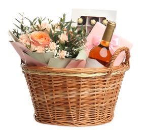 Wicker basket with different gifts on white background