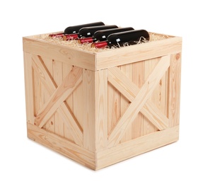 Photo of Wooden crate with bottles of wine isolated on white