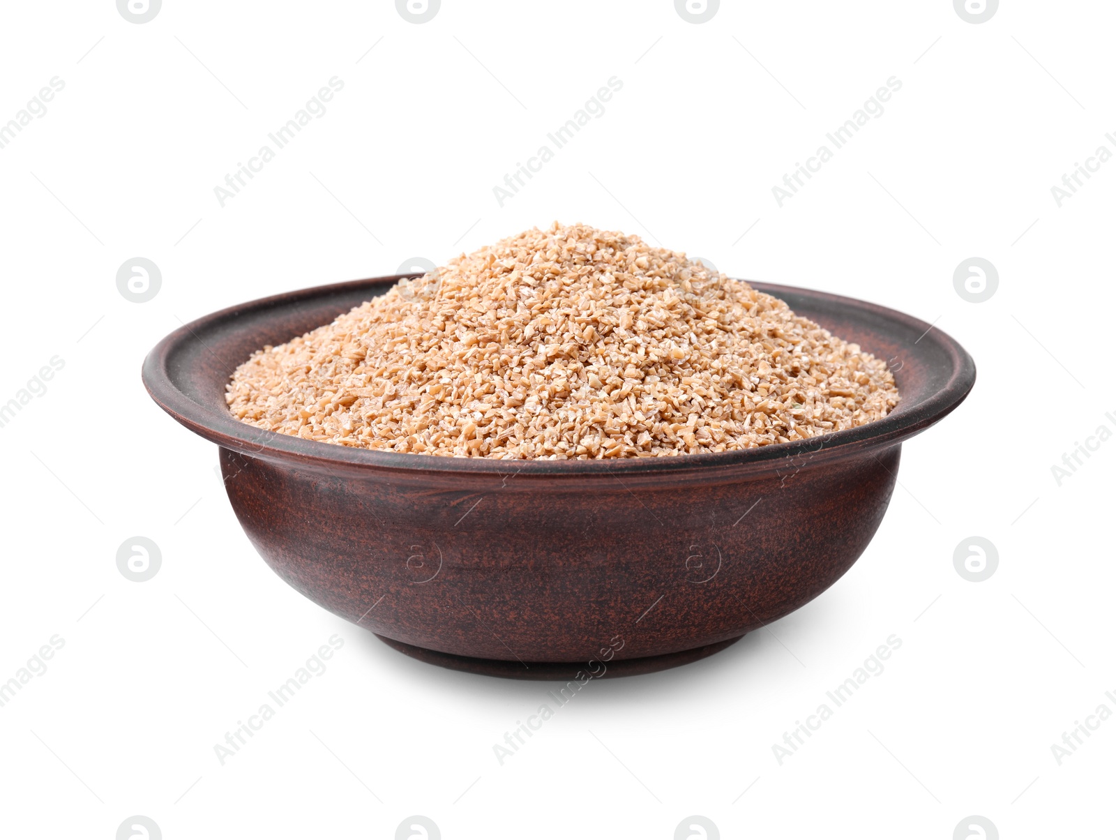 Photo of Dry wheat groats in bowl isolated on white