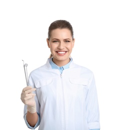 Female dentist holding professional tools on white background