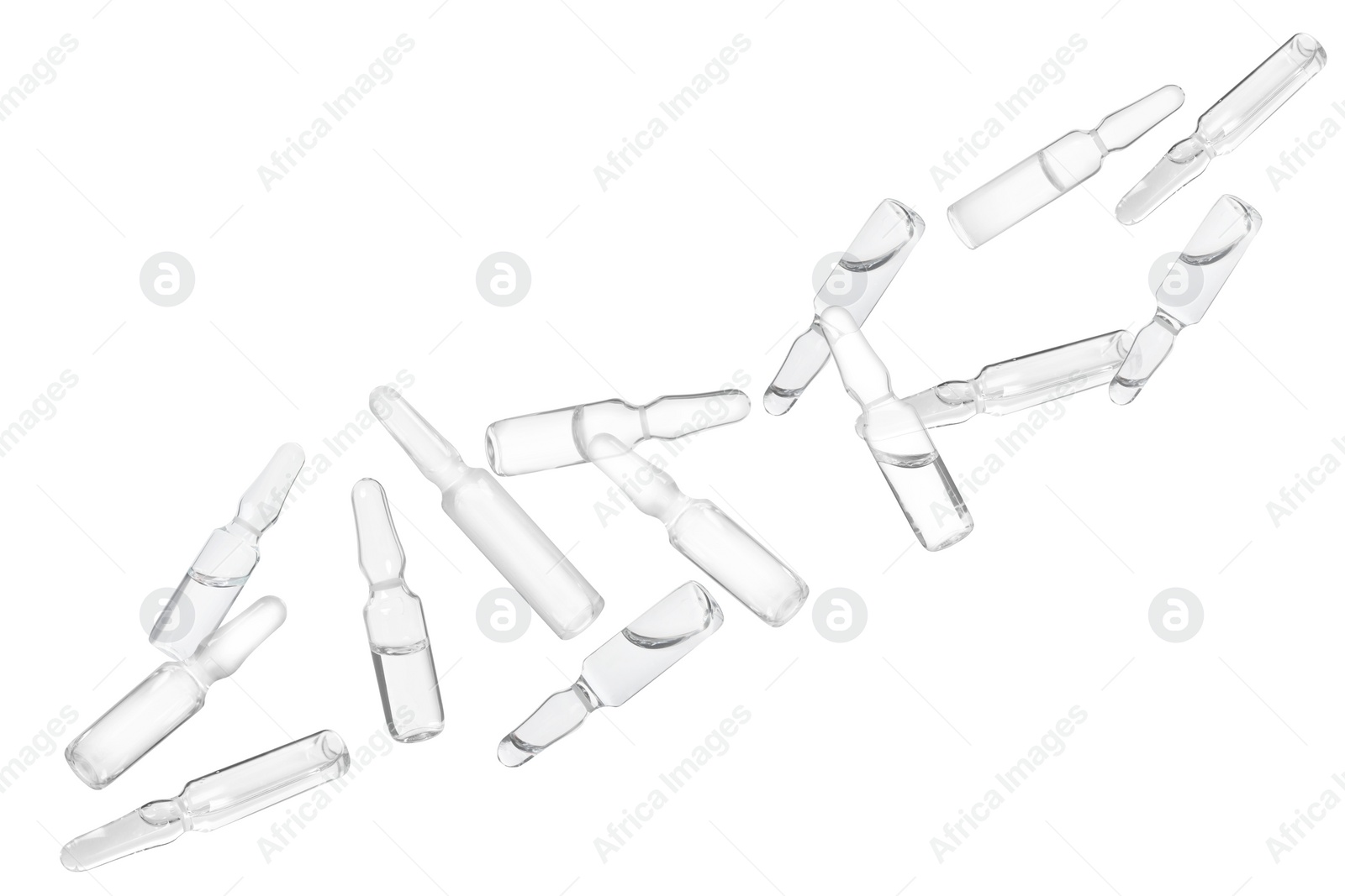 Image of Many glass ampoules with pharmaceutical products falling on white background