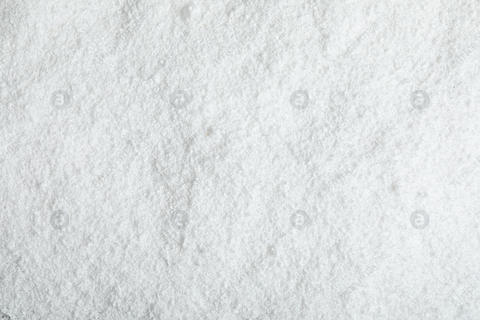 Photo of Pile of white snow as background, top view