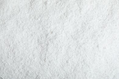 Photo of Pile of white snow as background, top view