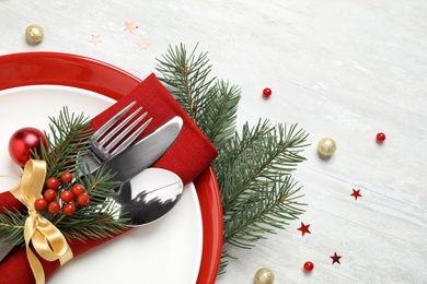 Photo of Christmas table setting on white background, closeup