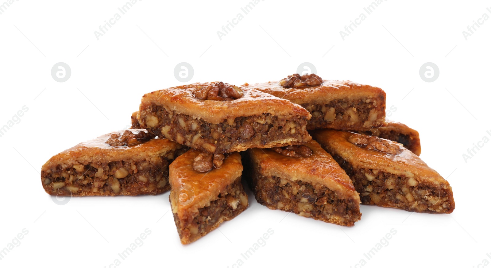 Photo of Delicious turkish baklava on white background. Eastern sweets