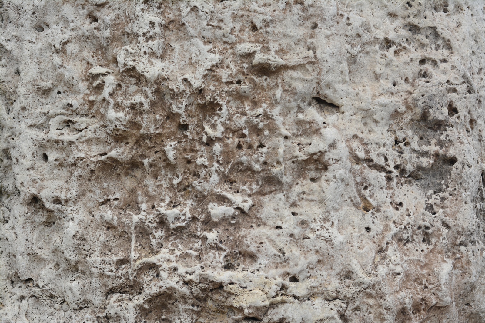 Photo of Closeup view of grey stone texture as background