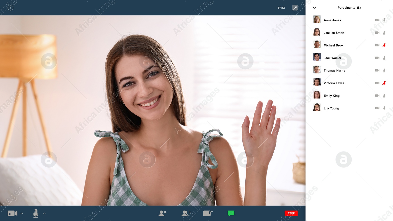 Image of Woman communicating with coworkers from home using video chat, view through camera