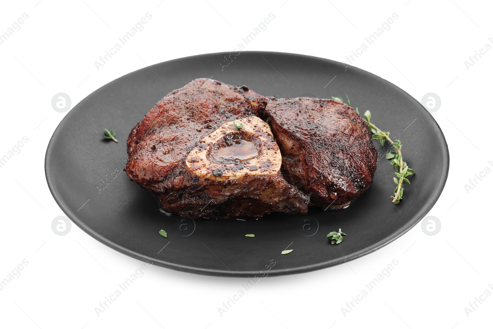 Photo of Delicious grilled beef meat with thyme isolated on white