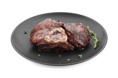 Delicious grilled beef meat with thyme isolated on white
