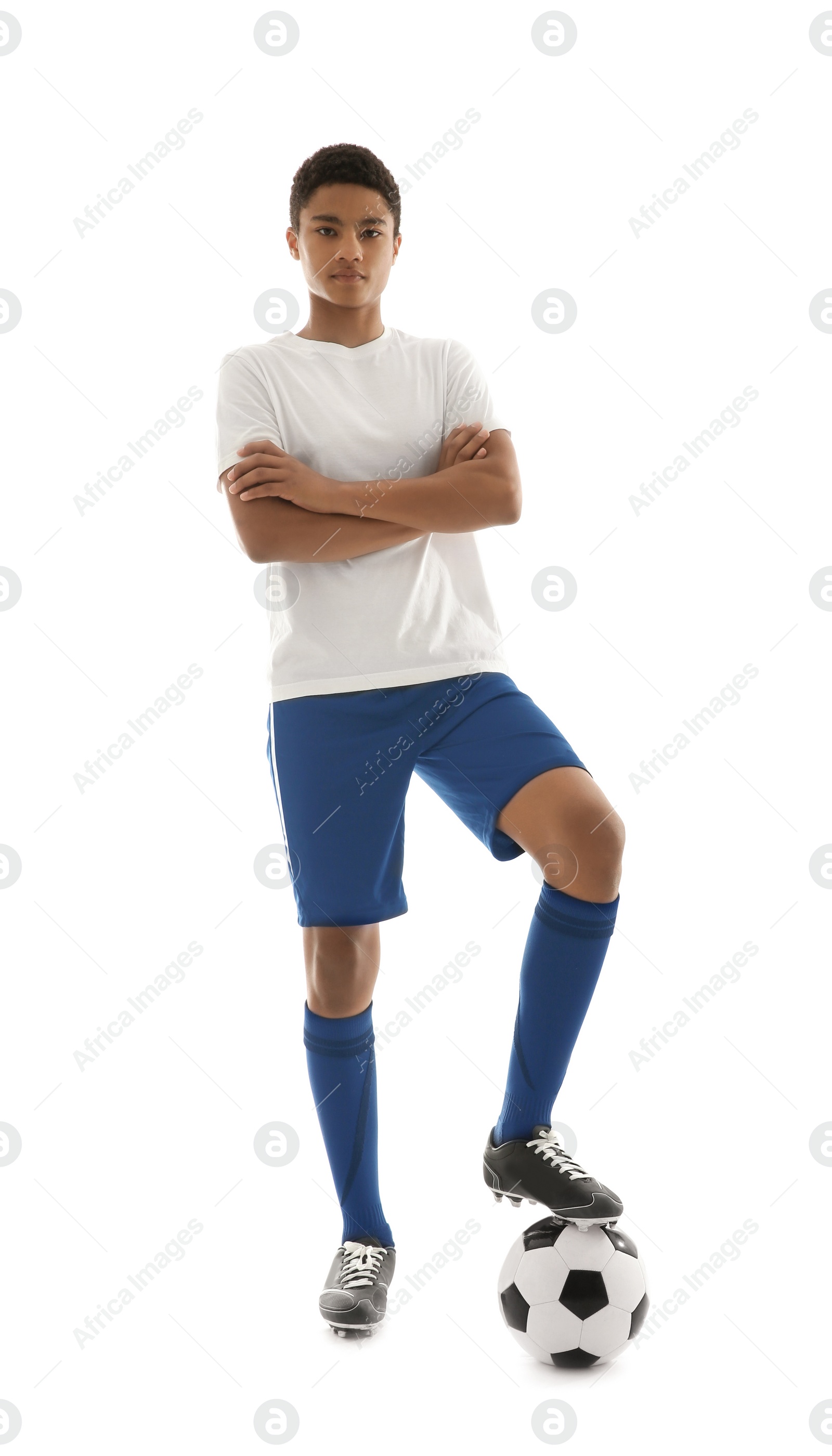 Photo of Teenage African-American football player on white background