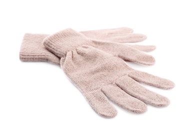 Pink woolen gloves on white background. Winter clothes