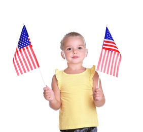 Photo of Little girl with American flags on white background