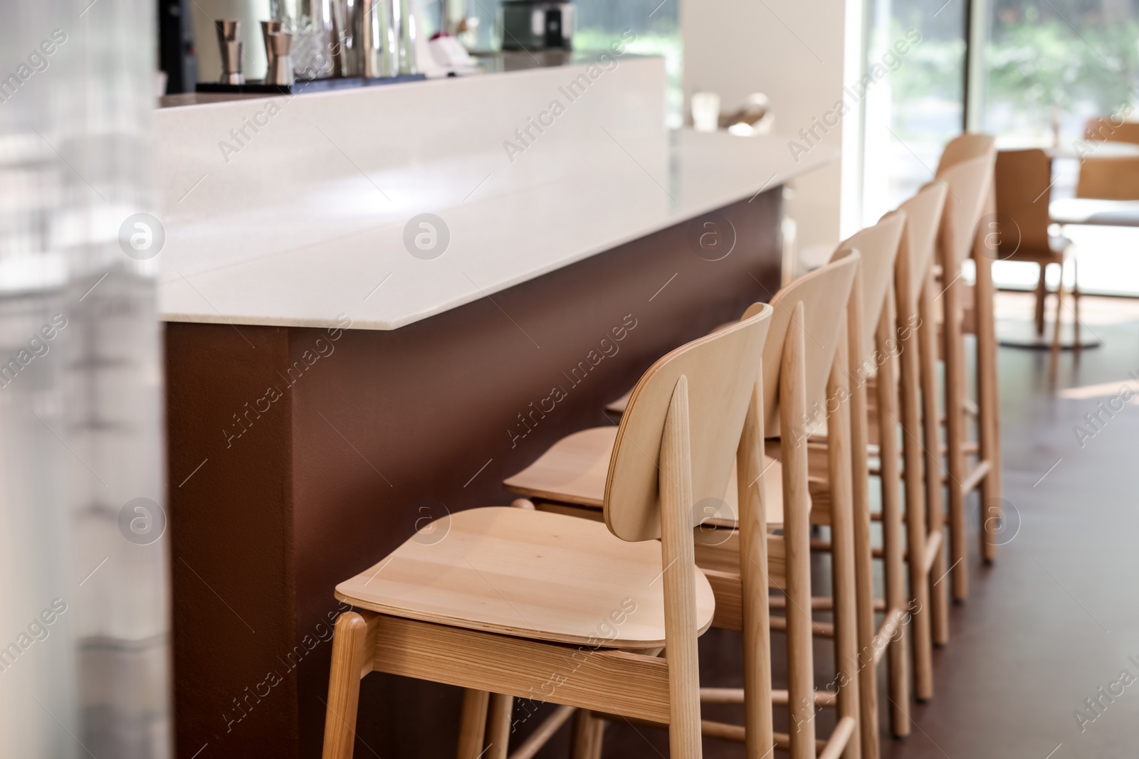 Photo of Modern cafe with stylish furniture. Interior design