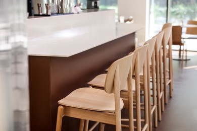 Photo of Modern cafe with stylish furniture. Interior design