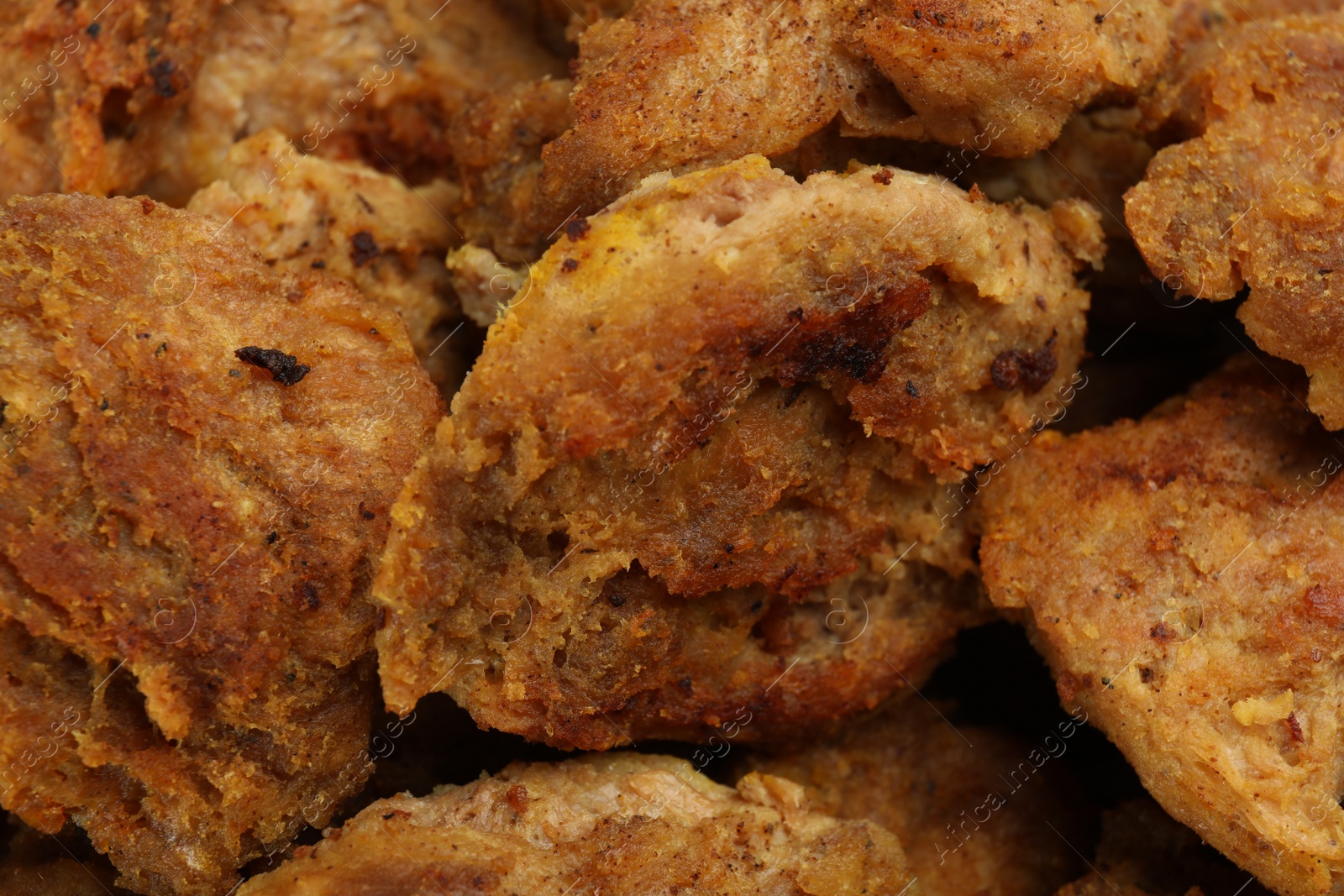 Photo of Delicious cooked soy meat as background, closeup