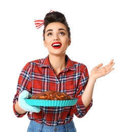 Photo of Funny young housewife with homemade pastry on white background